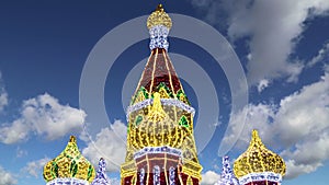 Fireworks over the Christmas decoration on the area of the Kiyevskaya Kiyevsky Railway Station at night, Moscow, Russia