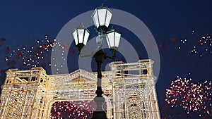 Fireworks over the Christmas illumination light gates/arches installations of Journey to Christmas in Moscow, Russia
