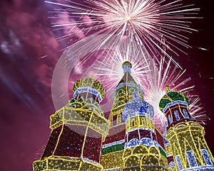 Fireworks over the Christmas New Year holidays decoration in Moscow at night, Russia