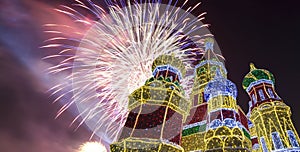 Fireworks over the Christmas New Year holidays decoration in Moscow at night, Russia