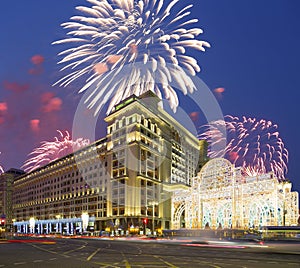 Fireworks over the Christmas and New Year holidays illumination and Four Seasons Hotel Moscow at night. Russia,