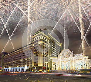 Fireworks over the Christmas and New Year holidays illumination and Four Seasons Hotel Moscow at night. Russia,