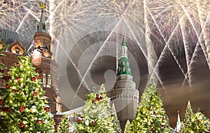 Fireworks over the Christmas and New Year holidays illumination at night, Kremlin in Moscow, Russia