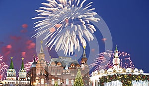 Fireworks over the Christmas New Year holidays illumination and State Historical Museum inscription in Russian,Moscow, Russia