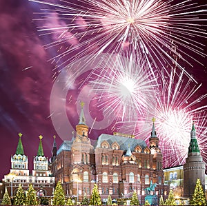 Fireworks over the Christmas New Year holidays illumination and State Historical Museum inscription in Russian,Moscow, Russia