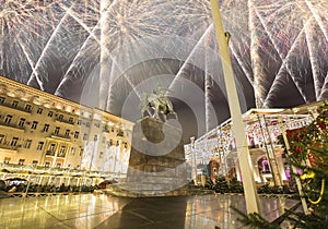 Fireworks over the Christmas and New Year holidays illumination. Yury Dolgoruky Monument, Russia