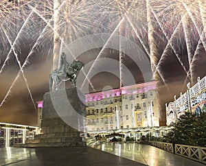 Fireworks over the Christmas and New Year holidays illumination. Yury Dolgoruky Monument, Russia