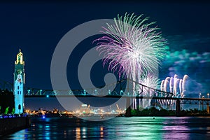 Fireworks over city bridge in Montreal