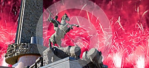Fireworks over the Monument to Saint George slaying a dragon on Poklonnaya hill in Victory Park,Moscow,Russia