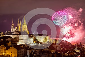 Fireworks over the Old Town of Prague, Czech Republic. New Year fireworks in Prague, Czechia. Prague fireworks during New Year