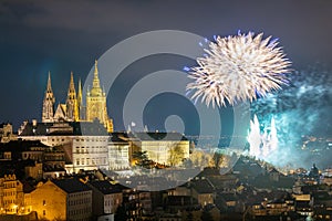 Fireworks over the Old Town of Prague, Czech Republic. New Year fireworks in Prague, Czechia. Prague fireworks during New Year