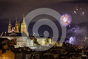 Fireworks over the Old Town of Prague, Czech Republic. New Year fireworks in Prague, Czechia. Prague fireworks during New Year