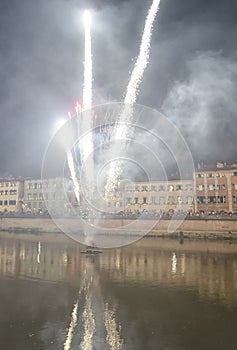 Fireworks over the river at Pisa