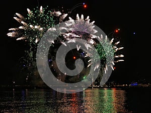Fireworks over the sea in Cannes. Evening colorful fire show festival
