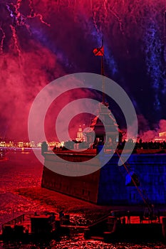 Fireworks over the water Holiday light. Night cityscape scene. Neva river, Saint-Petersburg, Russia. Holiday Scarlet Sails