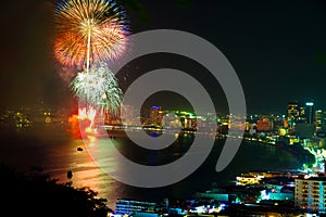 Fireworks with reflections at Pattaya Gulf