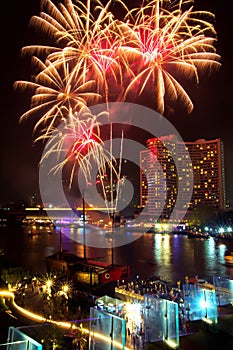 Fireworks show in Celebrate on festival day at Chao Phraya River at night time, Bangkok, Thailand. Beautiful of light