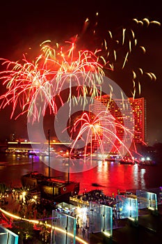 Fireworks show in Celebrate on festival day at Chao Phraya River at night time, Bangkok, Thailand. Beautiful of light.