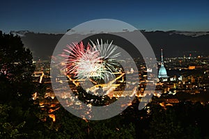 Fireworks show on panoramic scenic view of city downtown Turin Italy