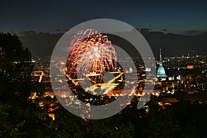 Fireworks show on panoramic scenic view of city downtown Turin Italy