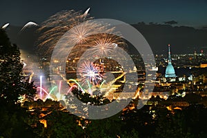 Fireworks show on panoramic scenic view of city downtown Turin Italy