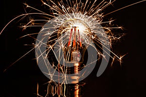 Fireworks sparkler showing through LED light bulb