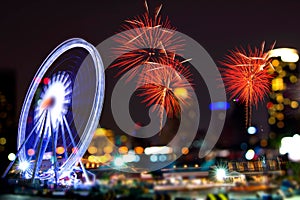 Fireworks Stock Image and Blurred Ferris Wheel