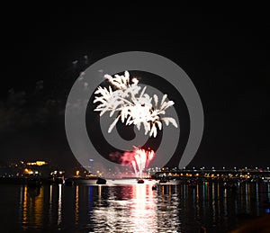 Fireworks of yellow tassels growing out of Golden bright red fountains