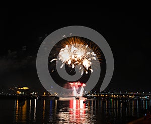 Fireworks of yellow tassels growing out of Golden red fountains