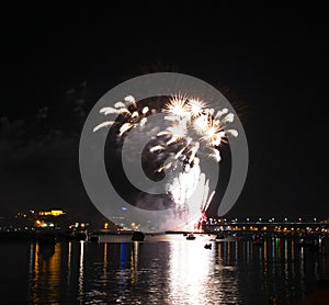 Fireworks of yellow tassels rising from purple fountains