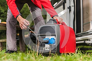 Firing Up Gas Powered Portable Inverter Generator photo