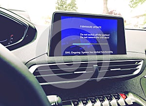 Firmware update on a modern car photo