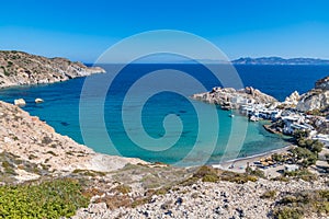 Firopotamos beach with church, houses and cliffs