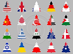 Firs with flags of different countries around the world. Collection of Christmas trees.