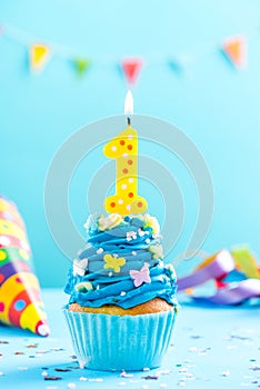 First 1st birthday cupcake with candle and sprinkles. Card mockup.