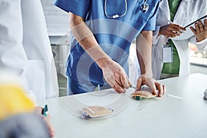 first aid hands-on learning, cropped