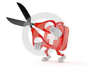 First aid kit character holding scissors