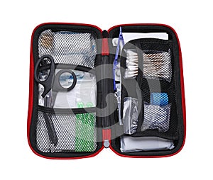 First aid kit with scissors, cotton buds and elastic bandage isolated on white, top view