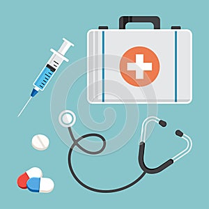 First aid kit, stethoscope, syringe, and pills. Vector illustration