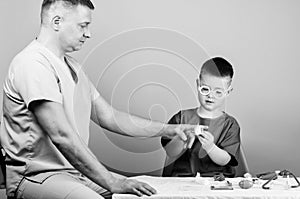 First aid. Medical help. Trauma and injurie. Medicine concept. Kid little doctor sit table medical tools. Health care photo