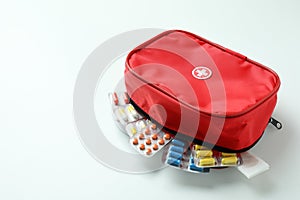 First aid medical kit on white background