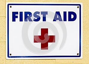 First Aid Sign on Wall