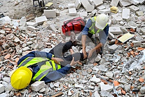 First aid support accident at work of builder worker on the concrete cement rubble