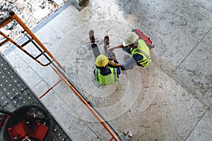 First aid support accident at work of builder worker in construction site