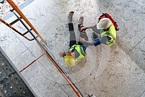 First aid support accident at work of construction worker at site