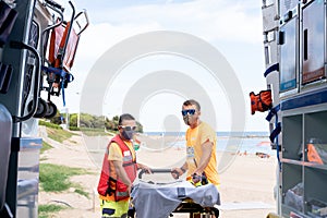 First aid team working on the beach