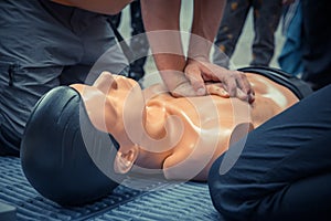 first aid training with dummy, heart massage