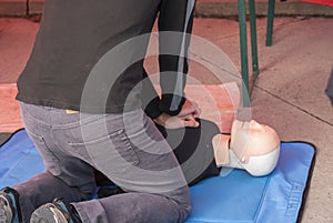 First aid training - A guy is learning how to make heart massage