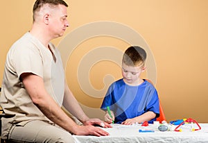 First aid. Trauma and injurie. Medicine concept. Kid little doctor sit table medical tools. Health care. Medical photo