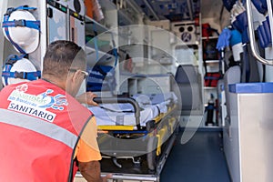 First aid worker working on an ambulance